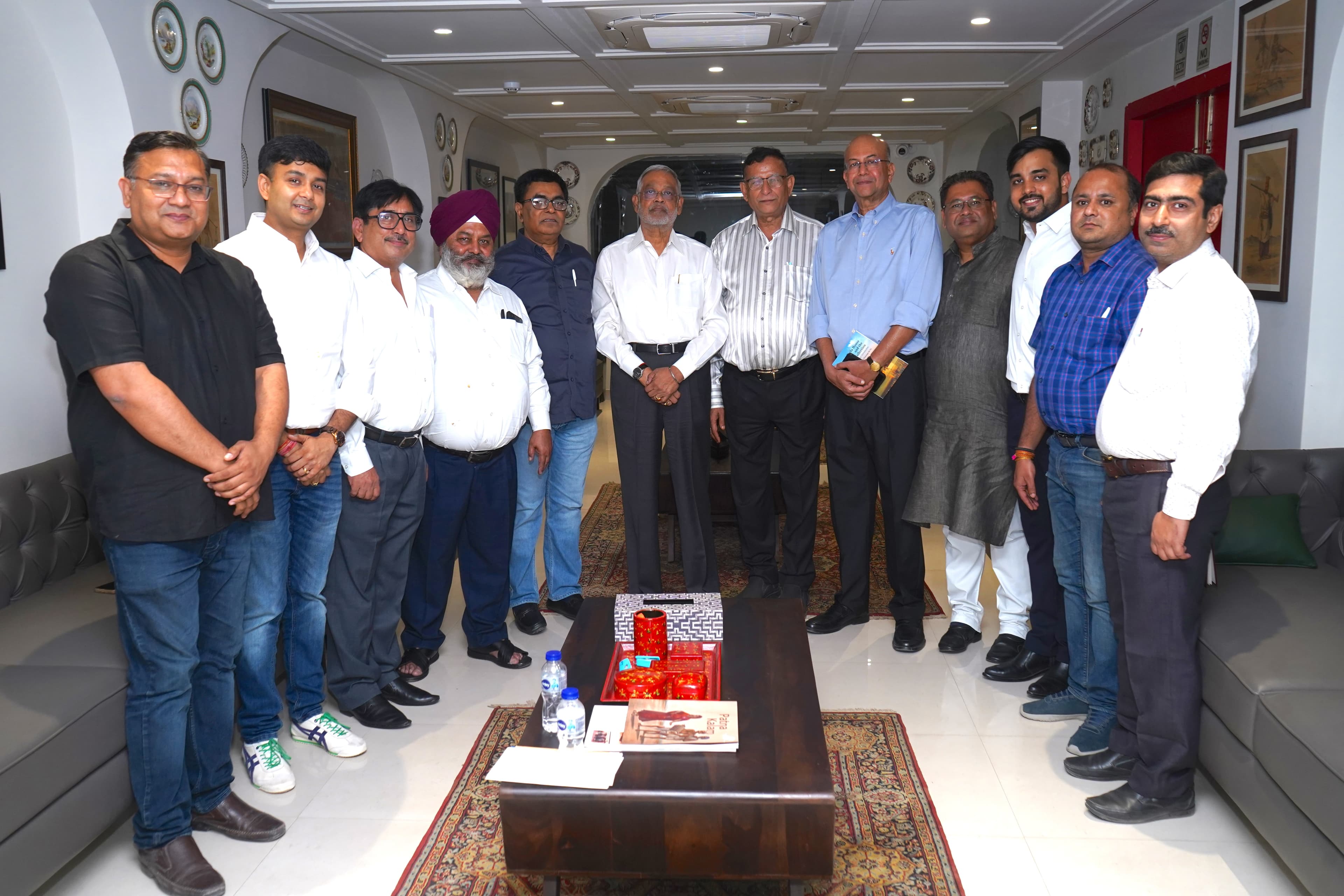 Group photograph of speakers, organisers and guests at Planet Patna