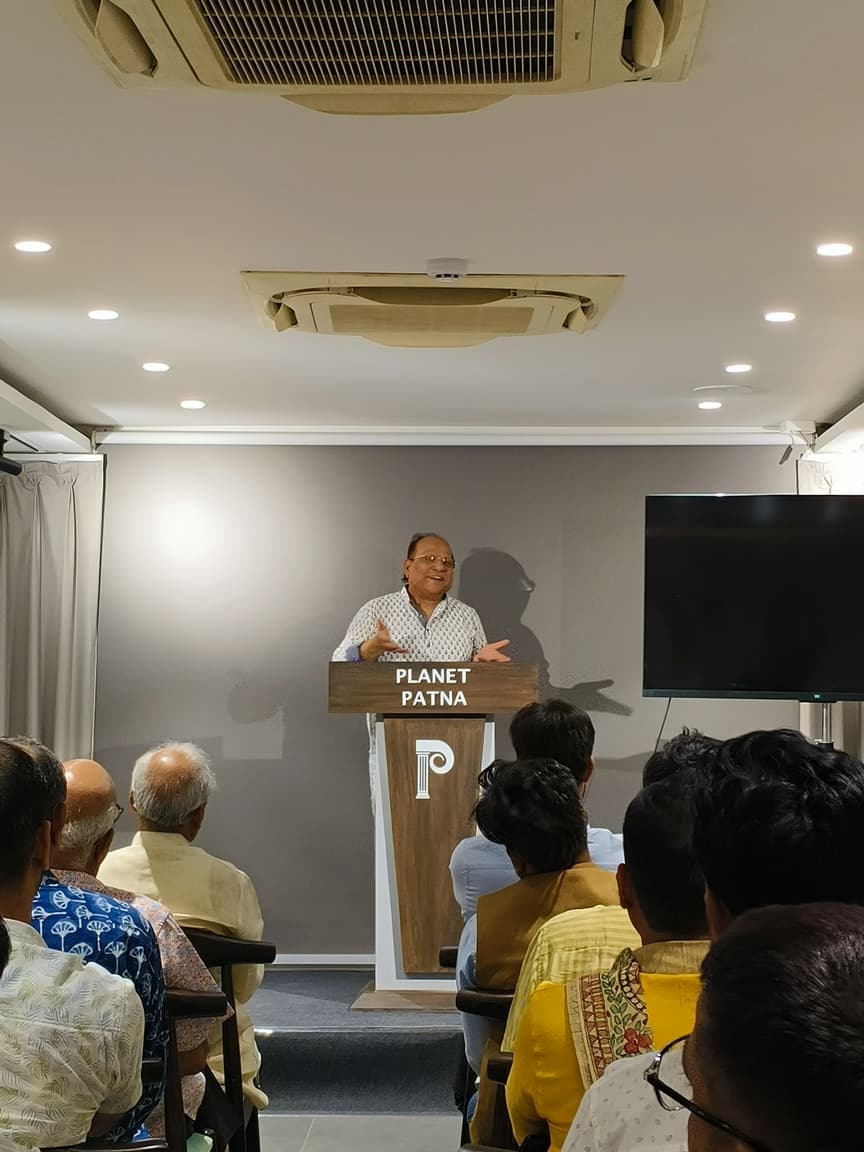 Speaker engaging with the audience at Planet Patna